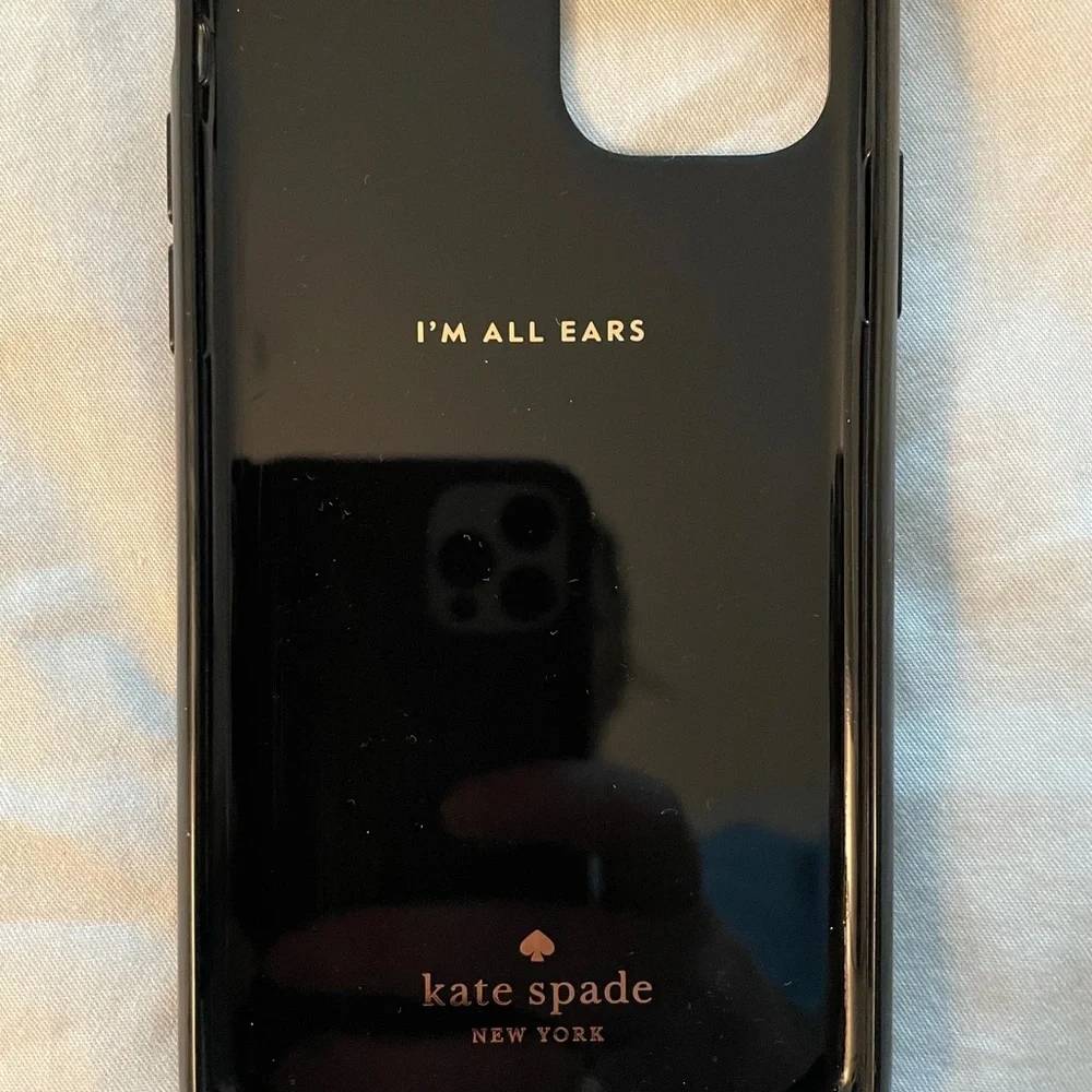 Kate Spade iPhone 11 Pro case with gold emblem stand